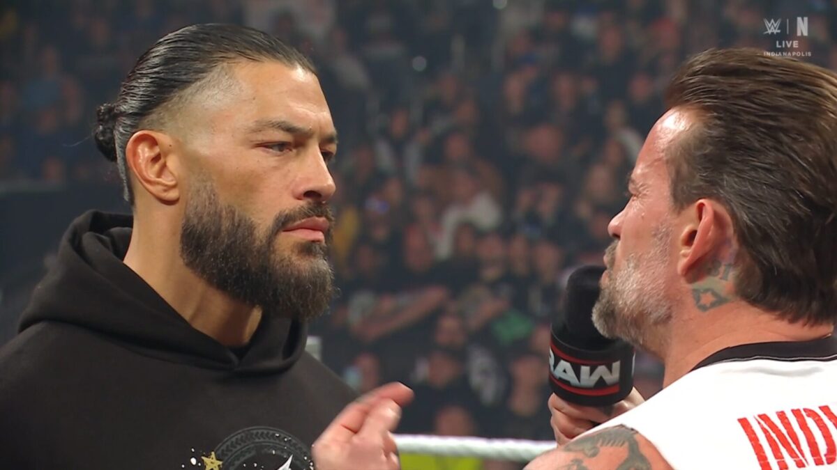 Roman Reigns e CM Punk no RAW